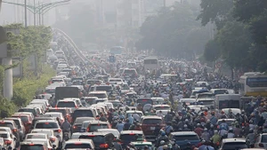 都市部の大気汚染の軽減は、多くの国民の関心を集めている課題である。（写真：キエウ・ミン）