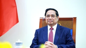 写真で見る：ファム・ミン・チン首相、シンガポール首相と電話会談