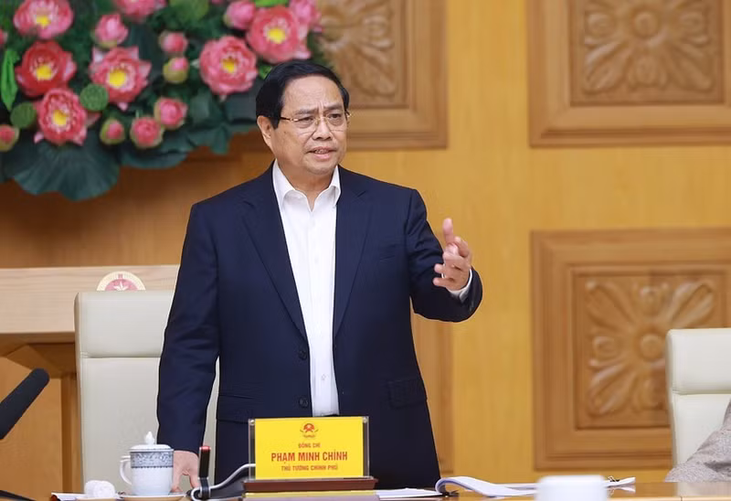 会議で発言するファム・ミン・チン首相（写真：VNA）